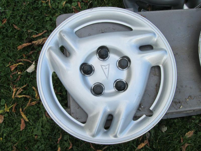 Buy Pontiac Grand Am 15 inch hubcap 9905 used OEM in Rochester, New