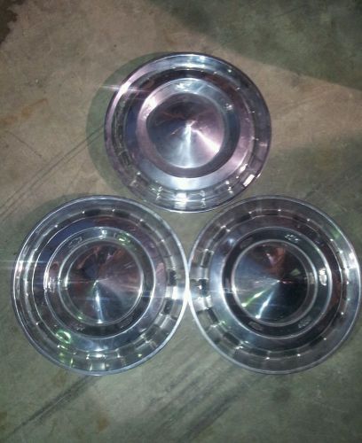 1956 chevrolet wheelcovers hubcaps gm original man cave garage art