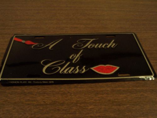 1979 touch of class red lips on black license plate