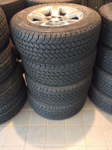 Gm 22901343 wheels (4) &amp; goodyear wrangler kevlar 255/65r17 tire set (4)