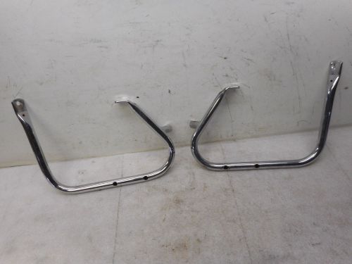 Harley 97-06 touring chrome rear  guards with holes for side rails.