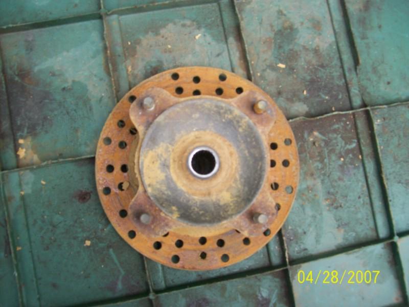 1997 kawasaki prairie 400 4wd front hub with rotor