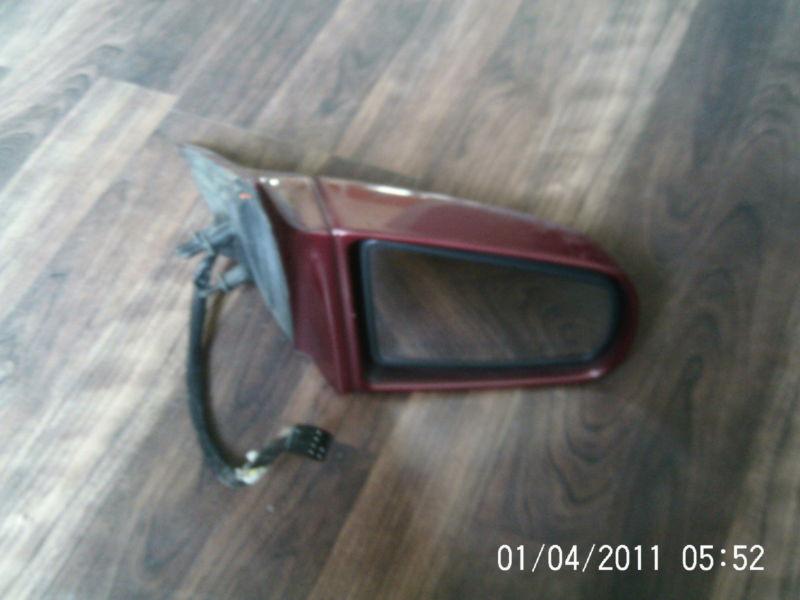 Cadillac sedan deville  passenger side view mirror maroon 1994-1999