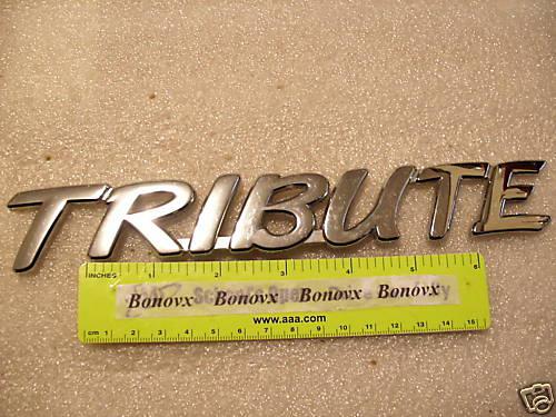 Chrome mazda tribute emblem used