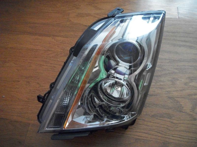 2010 cadillac cts left headlight oem