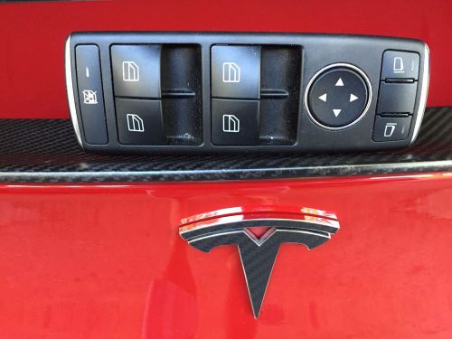 Tesla model s drivers' side window and mirror master switch. like-new condition