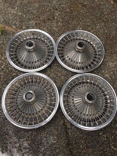 Vintage set of four 14&#034; ford, chevy, dodge wire spoke wheel covers hubcaps