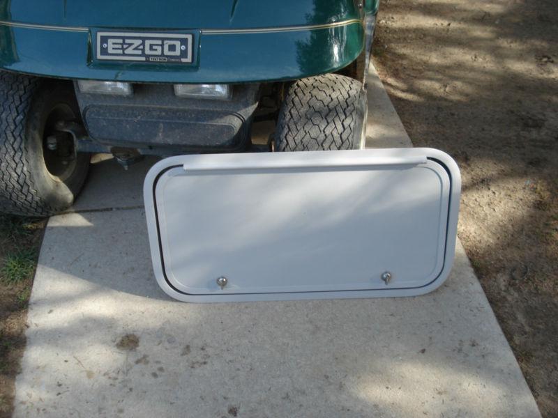 Trailer baggage door, clay color, 28" x 14", keys / locks / frame, etc. new