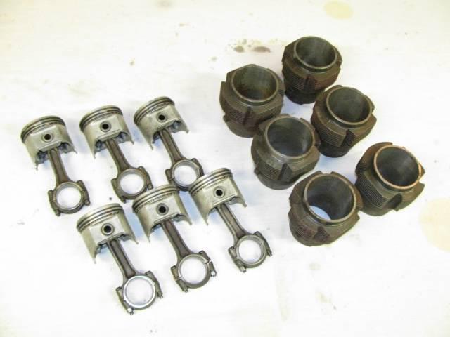 Nice complete set of chevy corvair oversized jugs & new pistons