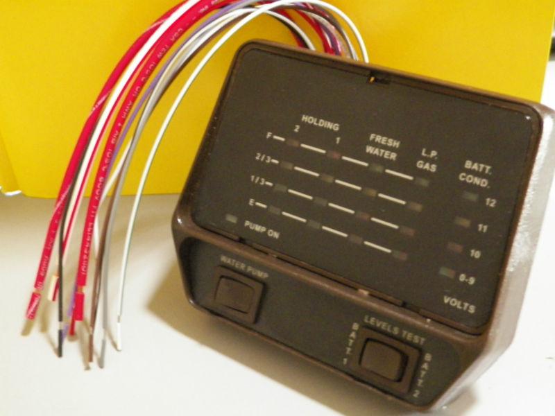 *new* rv holding 1/2 tank monitor fresh water, l.p gas, batt. cond. water pump 