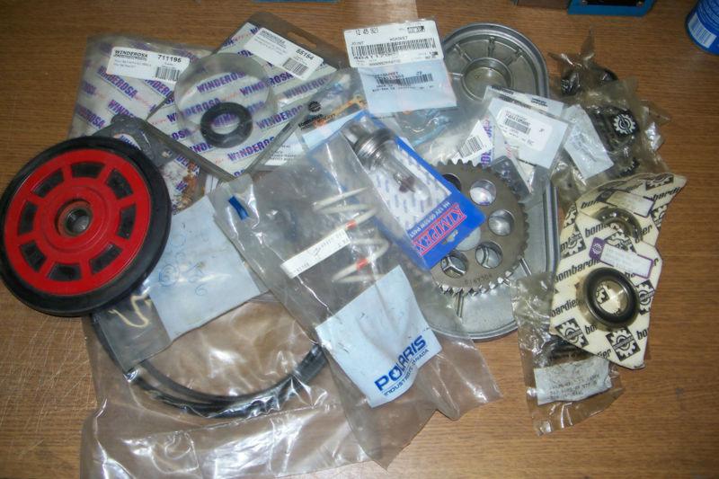 7041988 / 3222101 snowmobile parts lot as pictured - some new - some used - look
