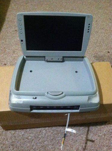 Dvd flip down over head dvd player