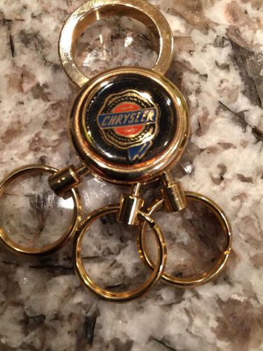 Vintage gold tone chrysler key chain with attached hanger fob made in usa