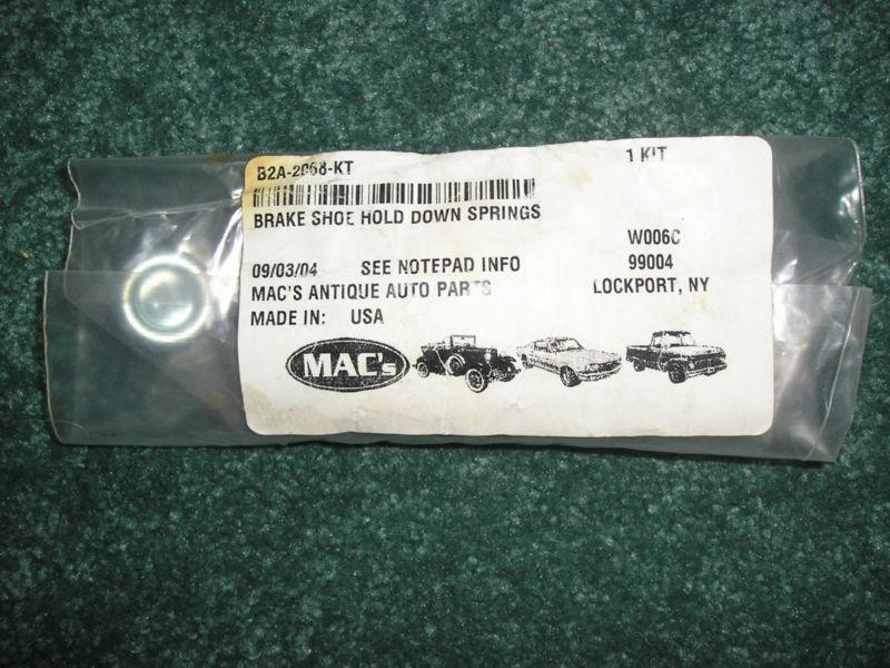 1955 to 1959, ford rear brake shoe hold down springs, kit.