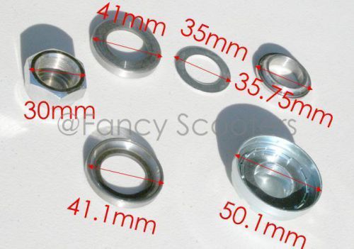 Triple tree center post bearing set for pit/dirt bike with center nut