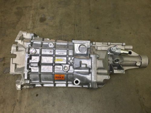 Tremec magnum xl 6 speed case. ford. with midplate, sensors, and tailhousing.