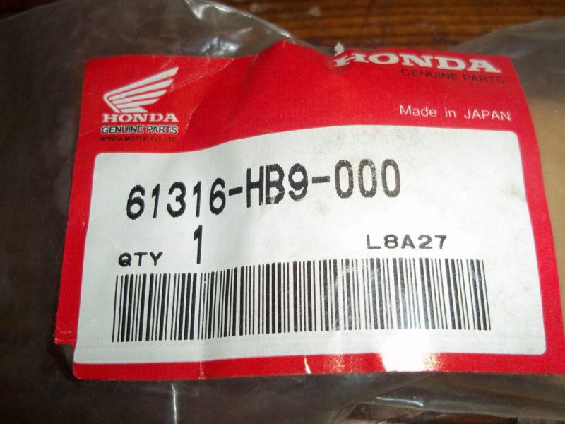 61316-hb9-000 headlight plate trk250r trx 250r 