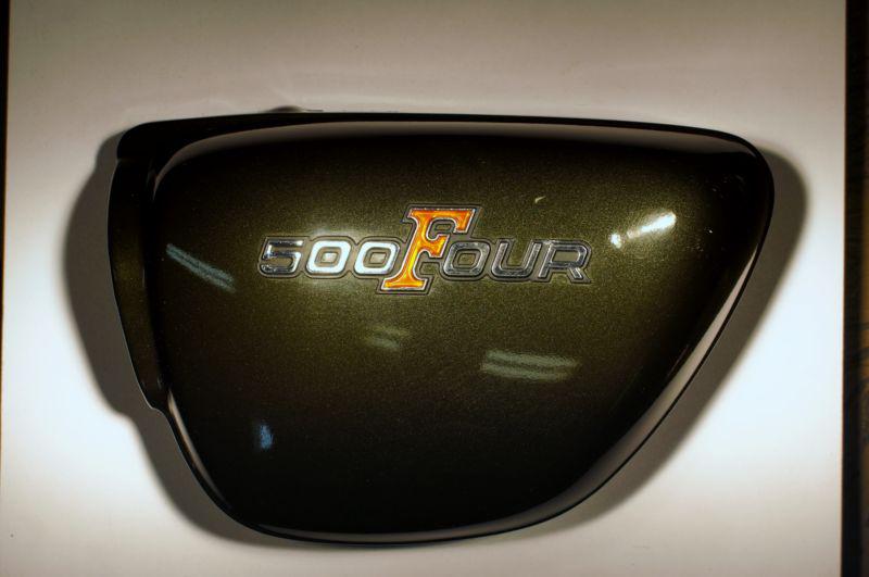 1973 honda cb500 four part # = 83700-323-020ly part = cover, l. side olive