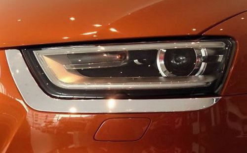A pair of chrome abs headlight trim kit for all q3