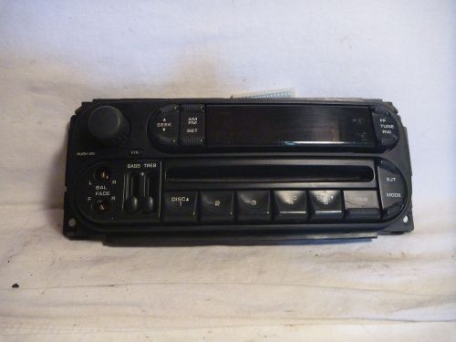 02-06 dodge caravan durango pt radio cd face plate p05064354ad lx085