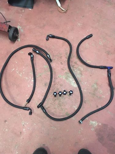 Fuel lines black stainless braided. summit racing earls and russell wrx sti