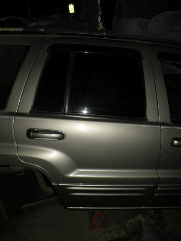 #3097  1999-2004 jeep grand cherokee right rear door  assembly   oem  paint ps4