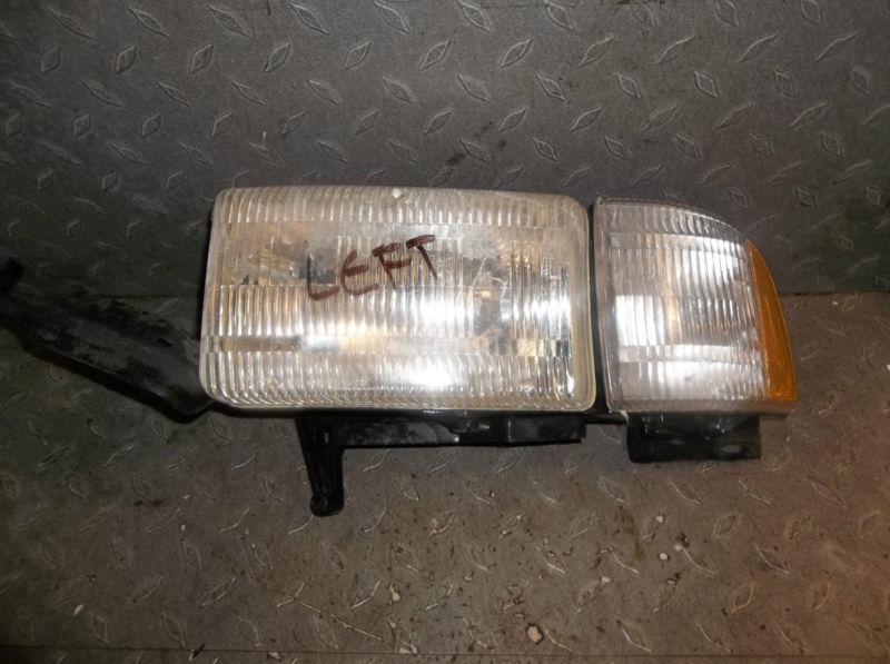 B 2000 dodge ram 2500 3500  left headlight head light *